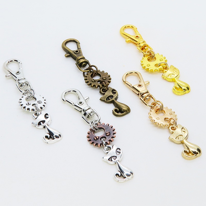 アンティークゴールド 猫と歯車・ギアを組合せたコンパクトなキーホルダー 金具交換可