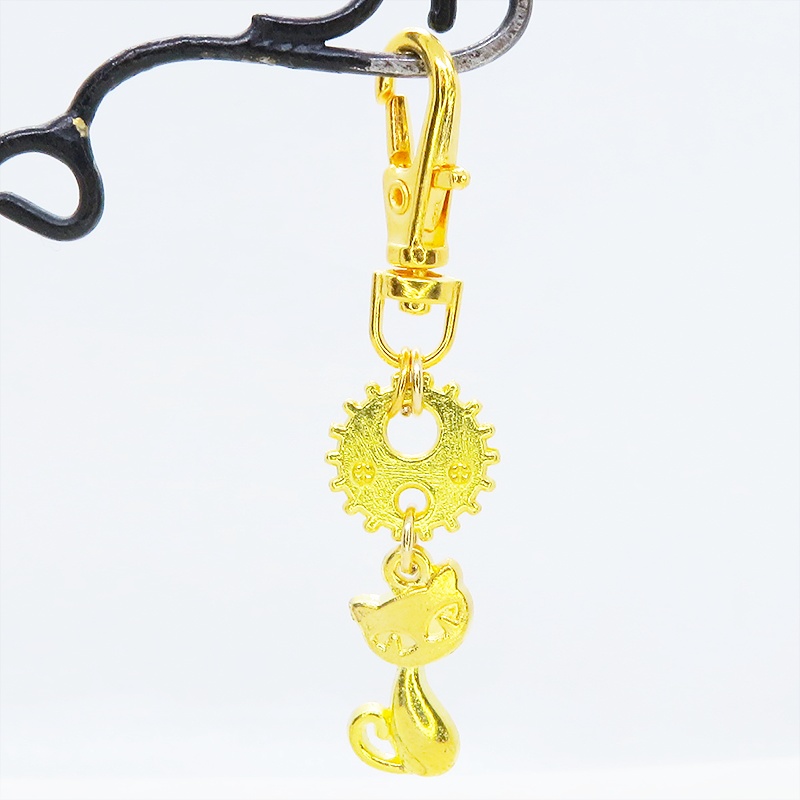 ゴールドカラー 猫と歯車・ギアを組合せたコンパクトなキーホルダー 金具交換可