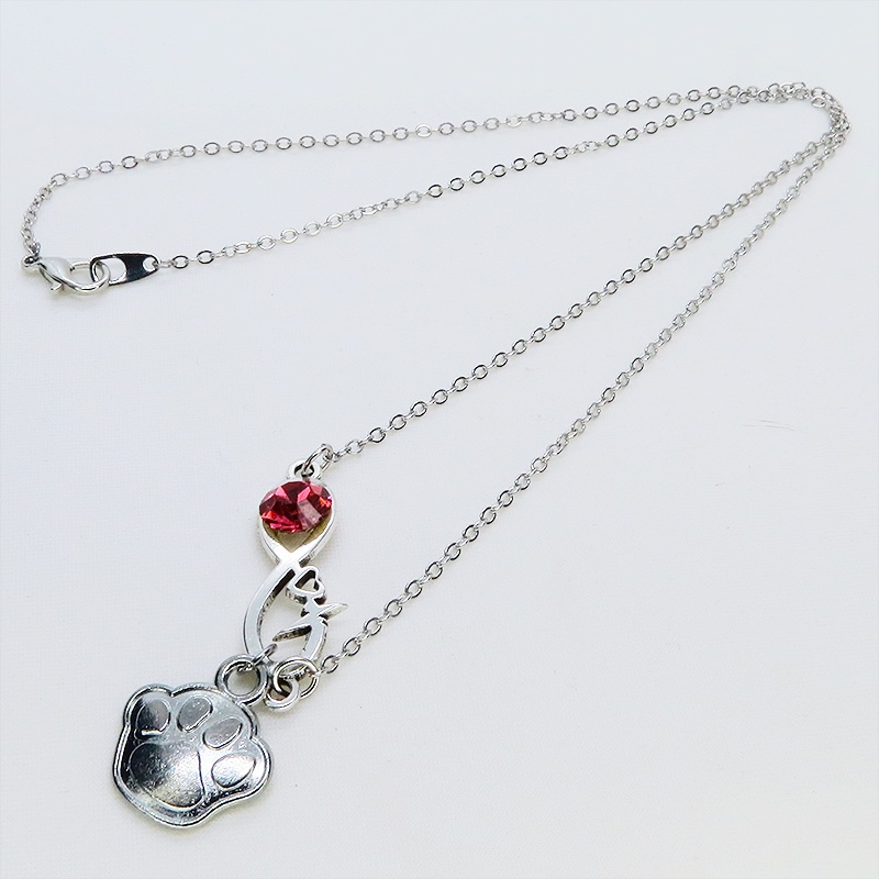 シルバーカラー クリスタル(マゼンタ)のエターニティーと肉球モチーフを組合せたネックレス ステンレス可 長さ調整可