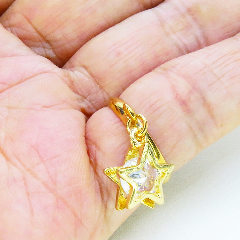 マットゴールド 星フレームのキュービックジルコニアのリング フリーサイズ(デフォルト13号)