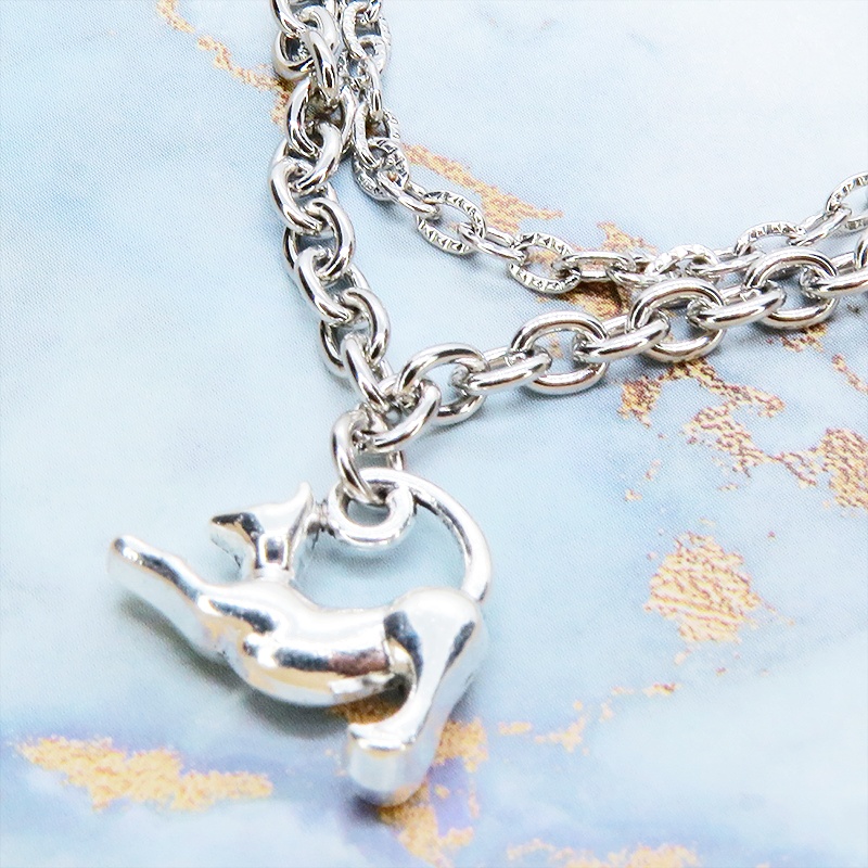 シルバーカラー 伸び猫シルエットモチーフのダブルチェーンブレスレット