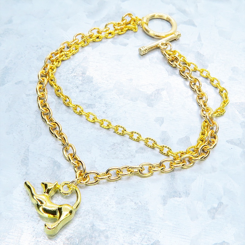 ゴールドカラー 伸び猫シルエットモチーフのダブルチェーンブレスレット