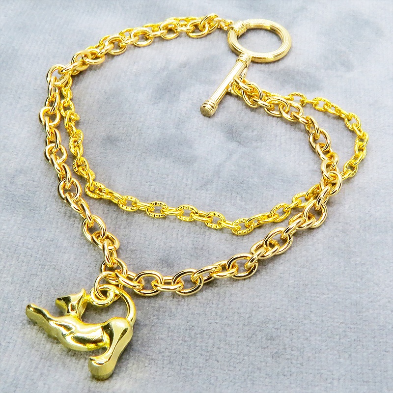 ゴールドカラー 伸び猫シルエットモチーフのダブルチェーンブレスレット