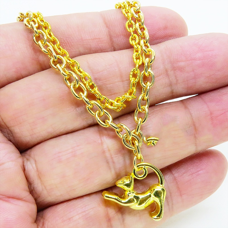 ゴールドカラー 伸び猫シルエットモチーフのダブルチェーンブレスレット