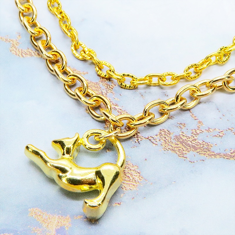ゴールドカラー 伸び猫シルエットモチーフのダブルチェーンブレスレット