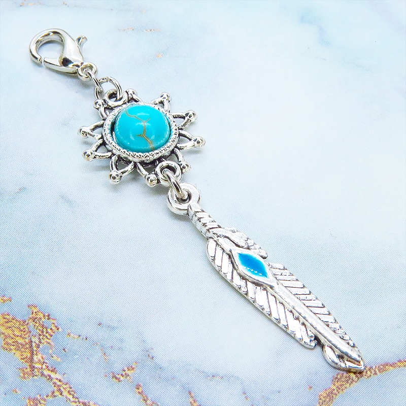 マスク・スマホチャーム アンティークシルバー フェザーとひまわりのチャーム ターコイズ 金具変更可