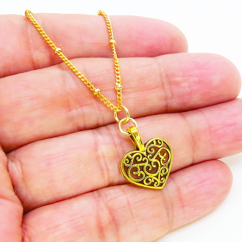 ゴールドカラー アラベスク調透かしのハートモチーフのブレスレット メタルビーズ付チェーン