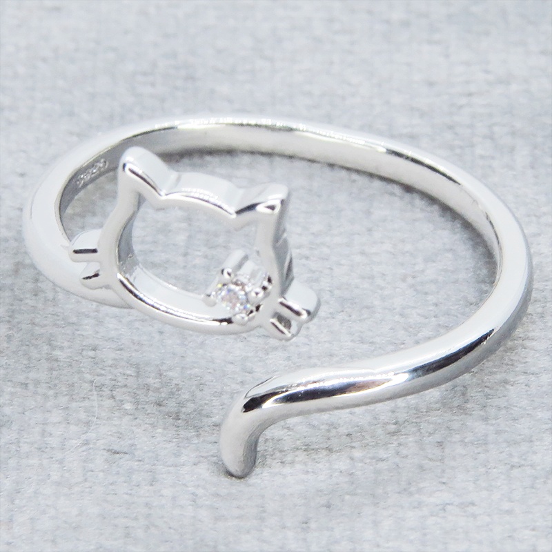 シルバー925 柔らかい曲線の猫シルエットモチーフのリング フリーサイズ キュービックジルコニア 尻尾