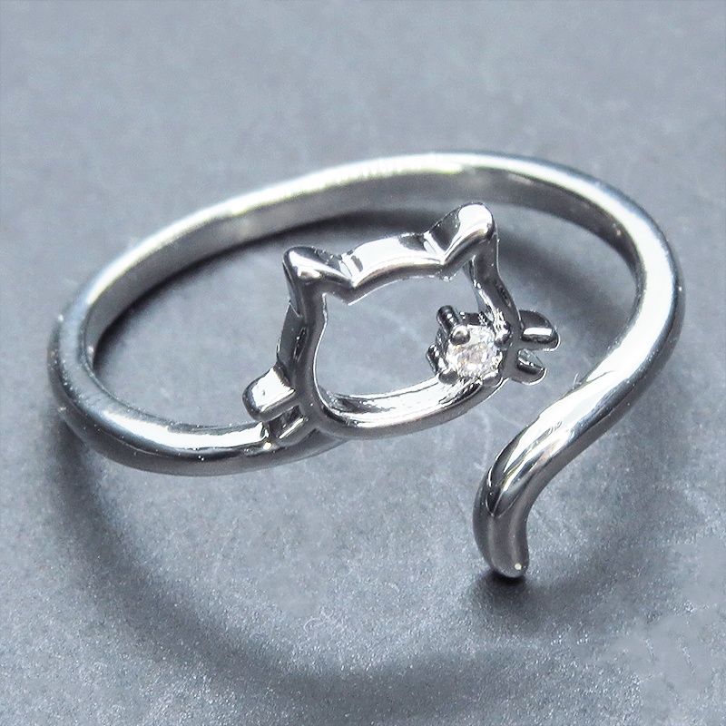シルバー925 柔らかい曲線の猫シルエットモチーフのリング フリーサイズ キュービックジルコニア 尻尾