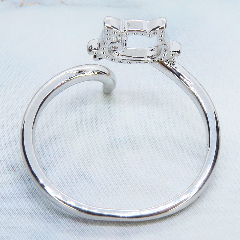 シルバー925 柔らかい曲線の猫シルエットモチーフのリング フリーサイズ キュービックジルコニア 尻尾