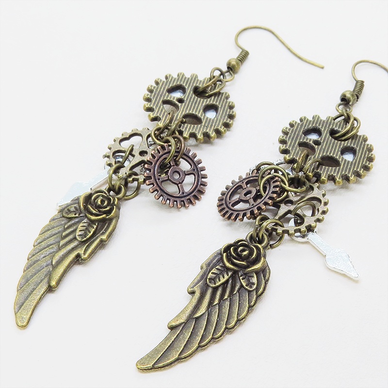 アンティークゴールド 翼と歯車を組合せた多層構造スチームパンクピアス ラインストーン