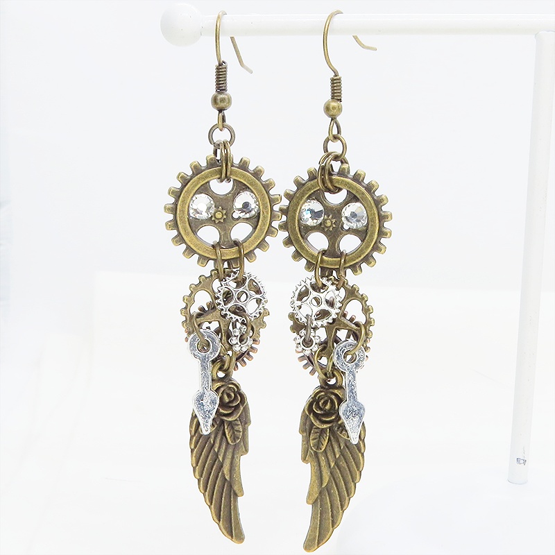 アンティークゴールド 翼と歯車を組合せた多層構造スチームパンクピアス ラインストーン