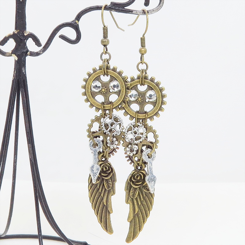 アンティークゴールド 翼と歯車を組合せた多層構造スチームパンクピアス ラインストーン