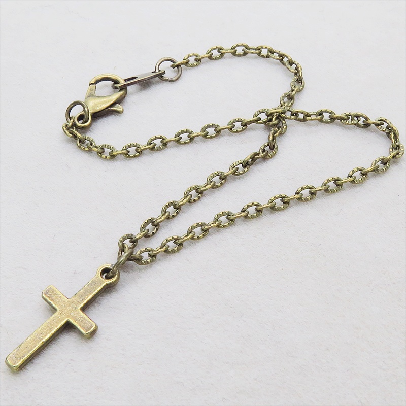 アンティークゴールド ロザリオチャームと模様入りチェーンのシンプルなブレスレット アジャスター追加可