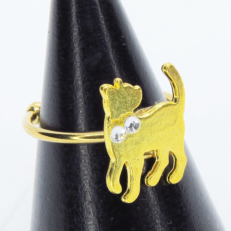 ゴールドカラー 振り向き猫シルエットモチーフのリング ラインストーン フリーサイズ