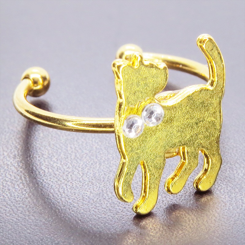 ゴールドカラー 振り向き猫シルエットモチーフのリング ラインストーン フリーサイズ