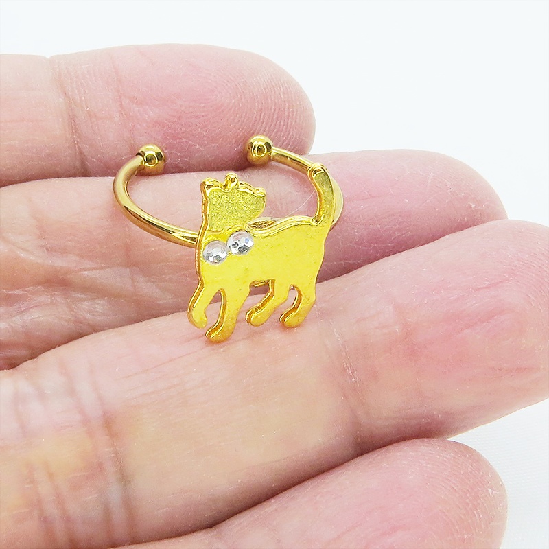 ゴールドカラー 振り向き猫シルエットモチーフのリング ラインストーン フリーサイズ