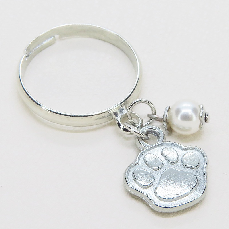 シルバーカラー 肉球とスワロフスキーパールの大人可愛いリング フリーサイズ クリスタルホワイト