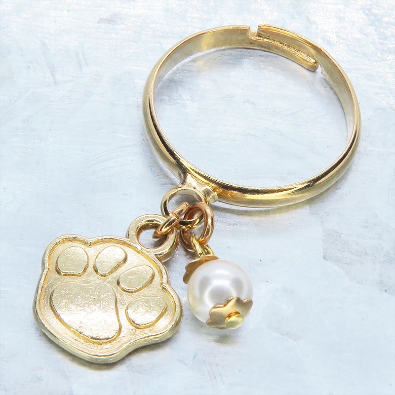 マットゴールド 肉球とスワロフスキーパールの大人可愛いリング フリーサイズ クリスタルホワイト