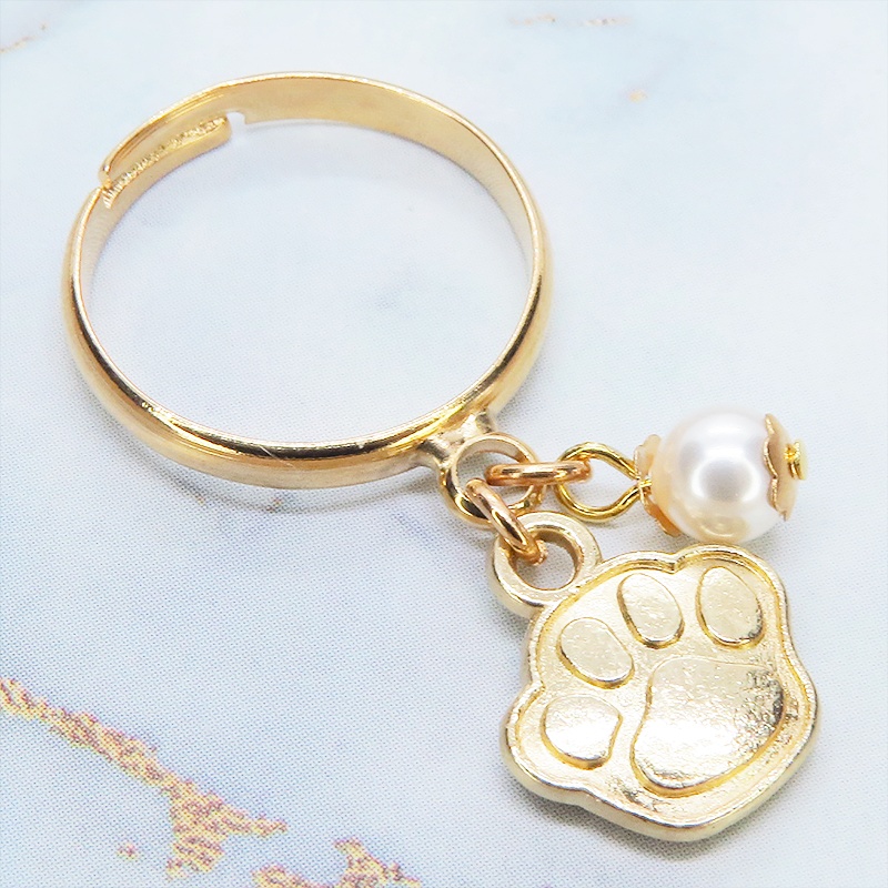 マットゴールド 肉球とスワロフスキーパールの大人可愛いリング フリーサイズ クリスタルホワイト