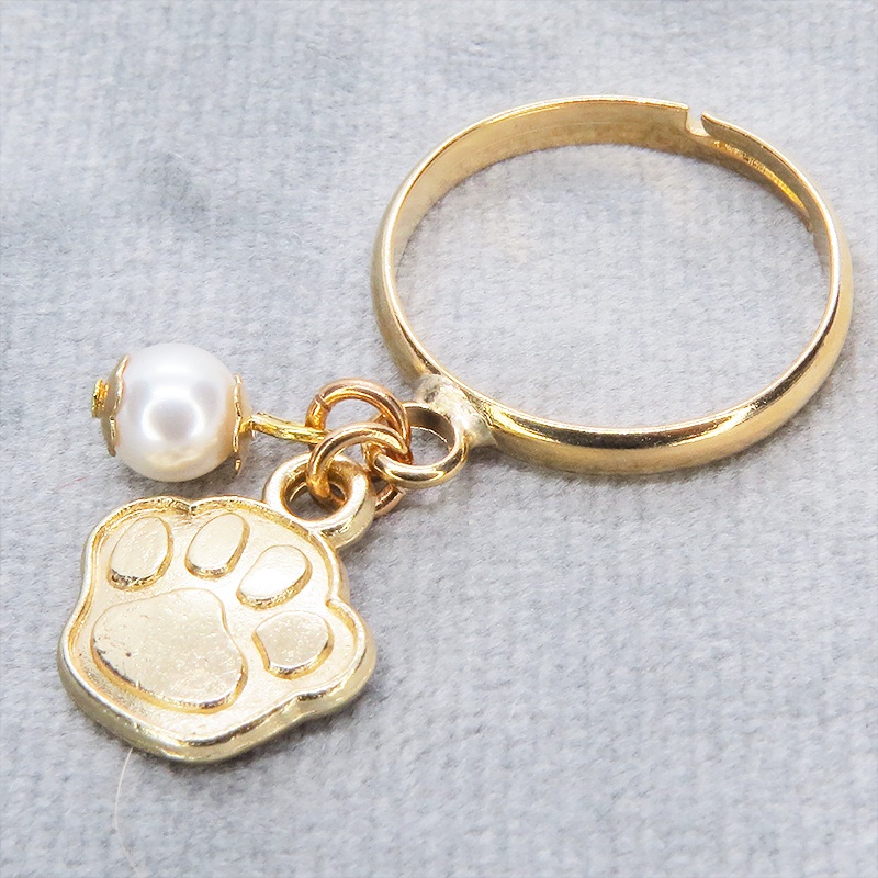 マットゴールド 肉球とスワロフスキーパールの大人可愛いリング フリーサイズ クリスタルホワイト