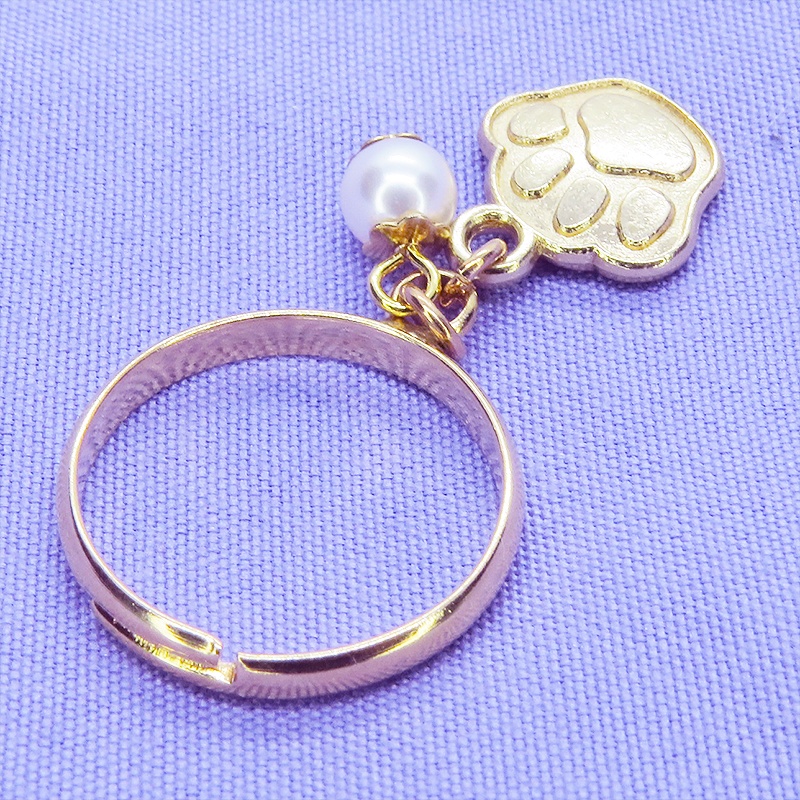 マットゴールド 肉球とスワロフスキーパールの大人可愛いリング フリーサイズ クリスタルホワイト