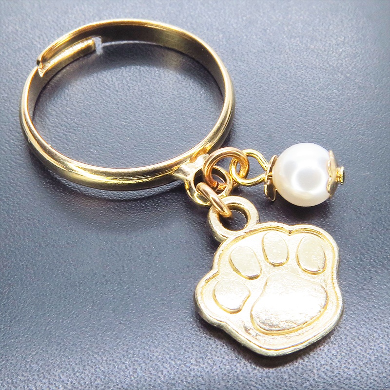 マットゴールド 肉球とスワロフスキーパールの大人可愛いリング フリーサイズ クリスタルホワイト