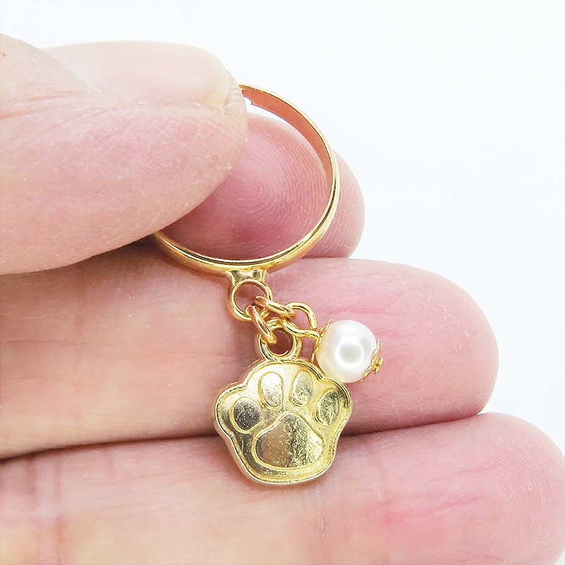 マットゴールド 肉球とスワロフスキーパールの大人可愛いリング フリーサイズ クリスタルホワイト