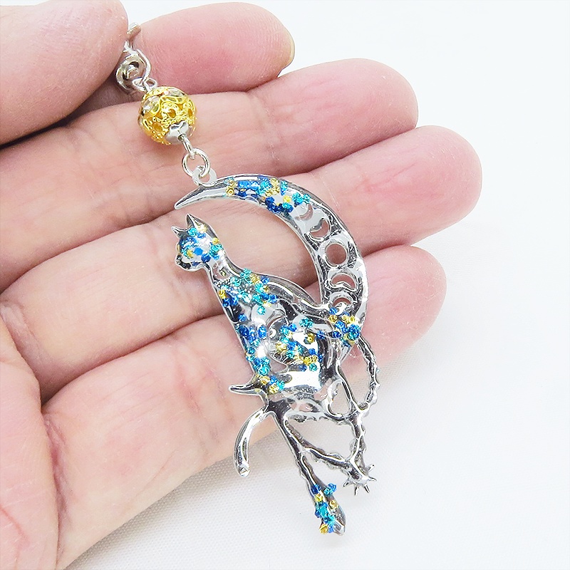 ステンレス製 シルバーカラー 三日月に乗る猫シルエットのキーホルダー ラインストーン レジン加工 ゴールドカラーメタルビーズ 金具変更可