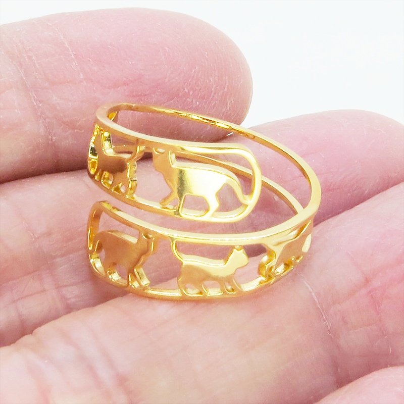 ステンレス製 ゴールドカラー 歩く猫シルエットが連なる大人可愛いリング フリーサイズ