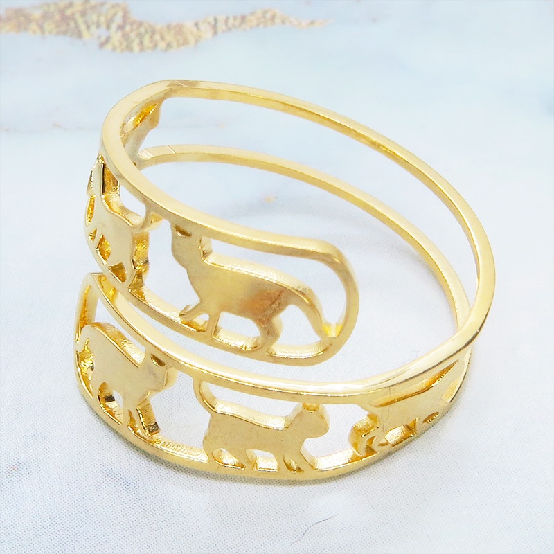 ステンレス製 ゴールドカラー 歩く猫シルエットが連なる大人可愛いリング フリーサイズ