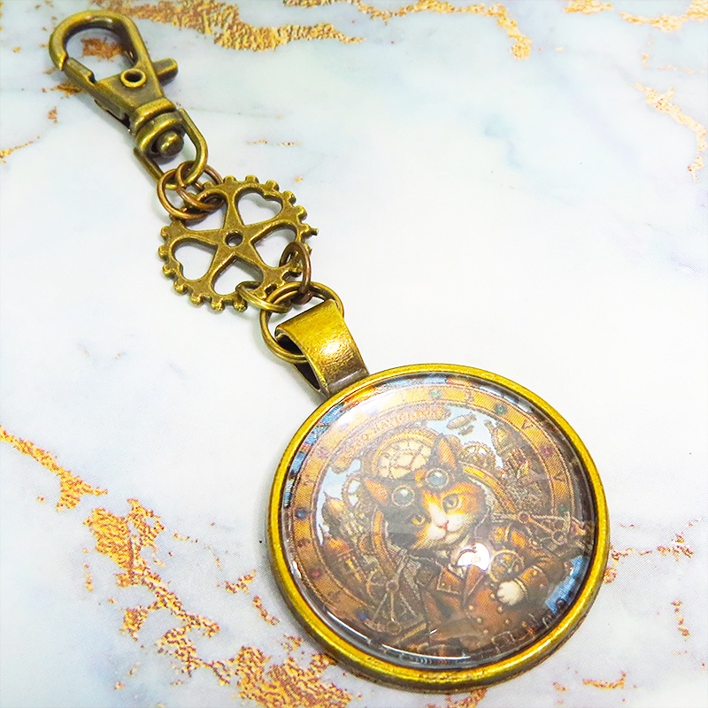 アンティークゴールド カボションペンダントキーホルダー スチームパンク 三毛猫パイロット 金具変更可