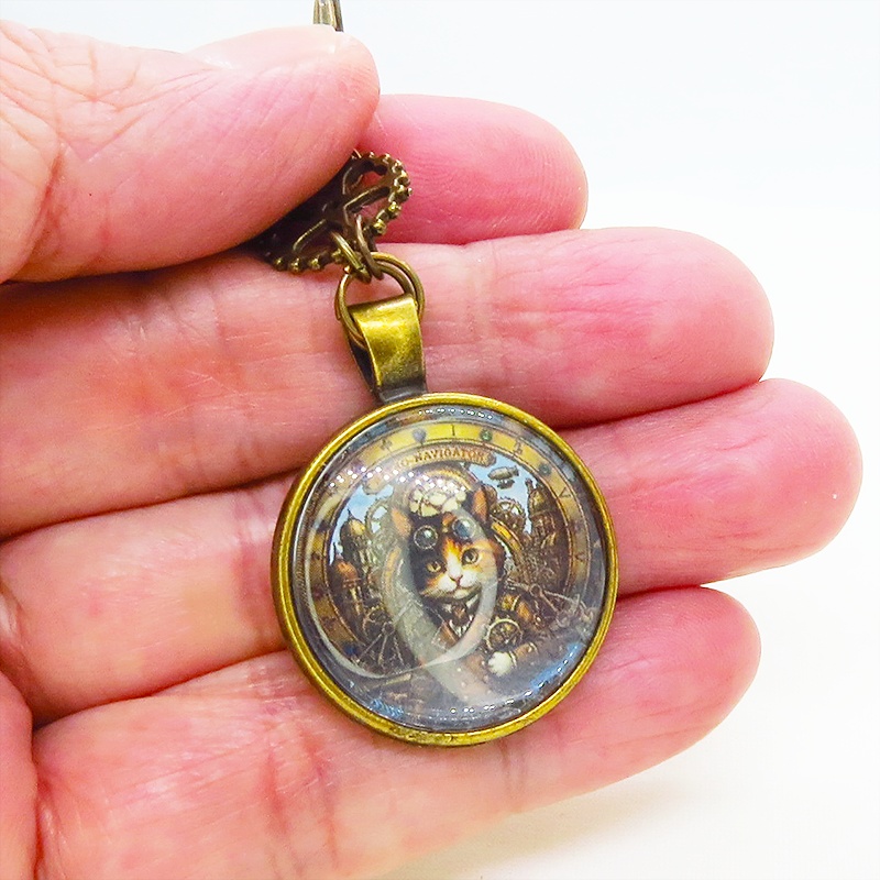 アンティークゴールド カボションペンダントキーホルダー スチームパンク 三毛猫パイロット 金具変更可