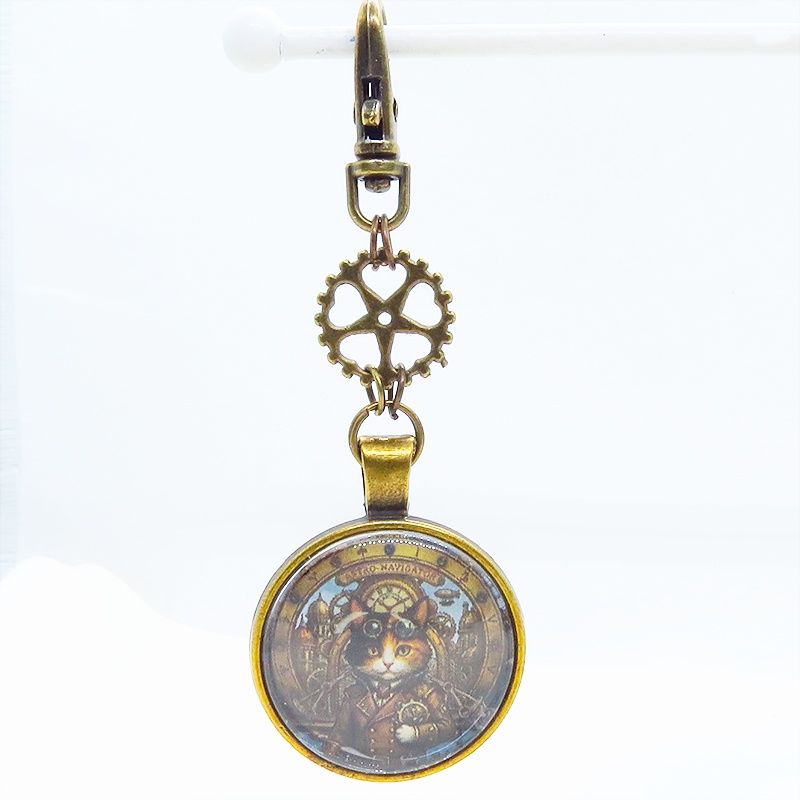 アンティークゴールド カボションペンダントキーホルダー スチームパンク 三毛猫パイロット 金具変更可