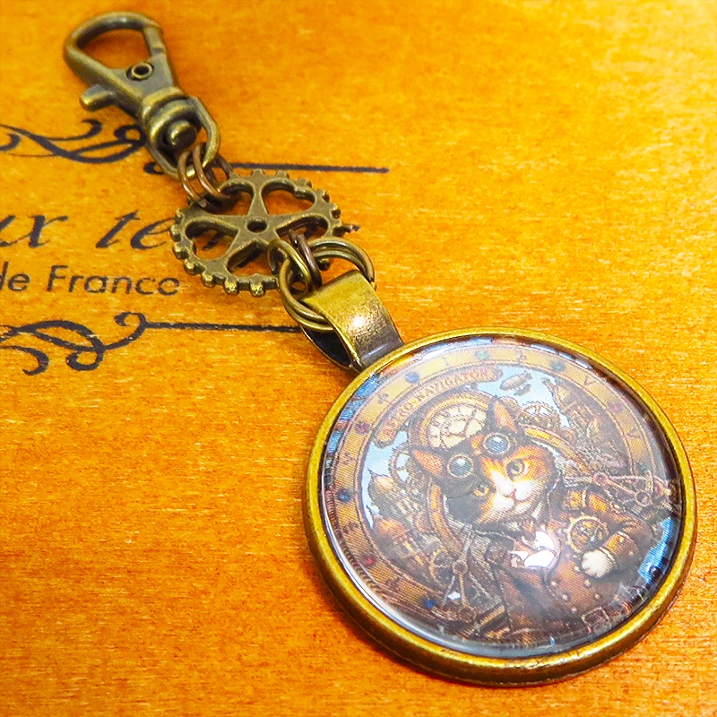 アンティークゴールド カボションペンダントキーホルダー スチームパンク 三毛猫パイロット 金具変更可