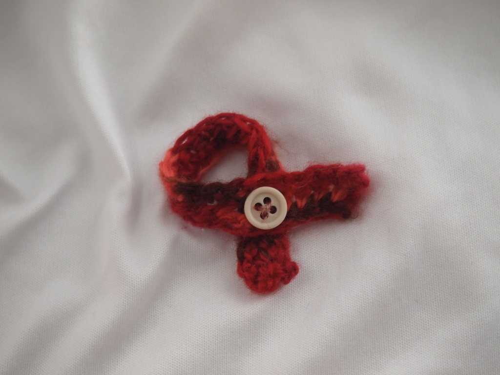 ボタンマフラー