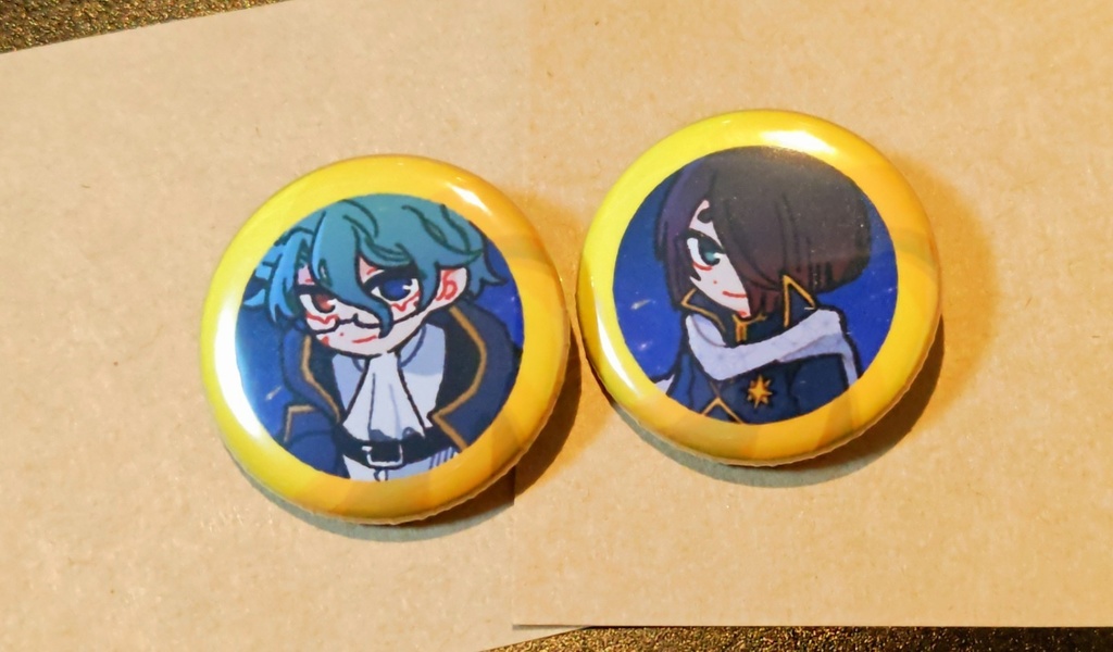 指輪から覗き込む風缶バッジ