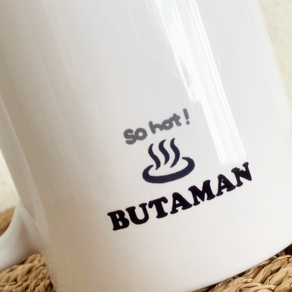 BUTAMAN Face マグカップ (ブラック)