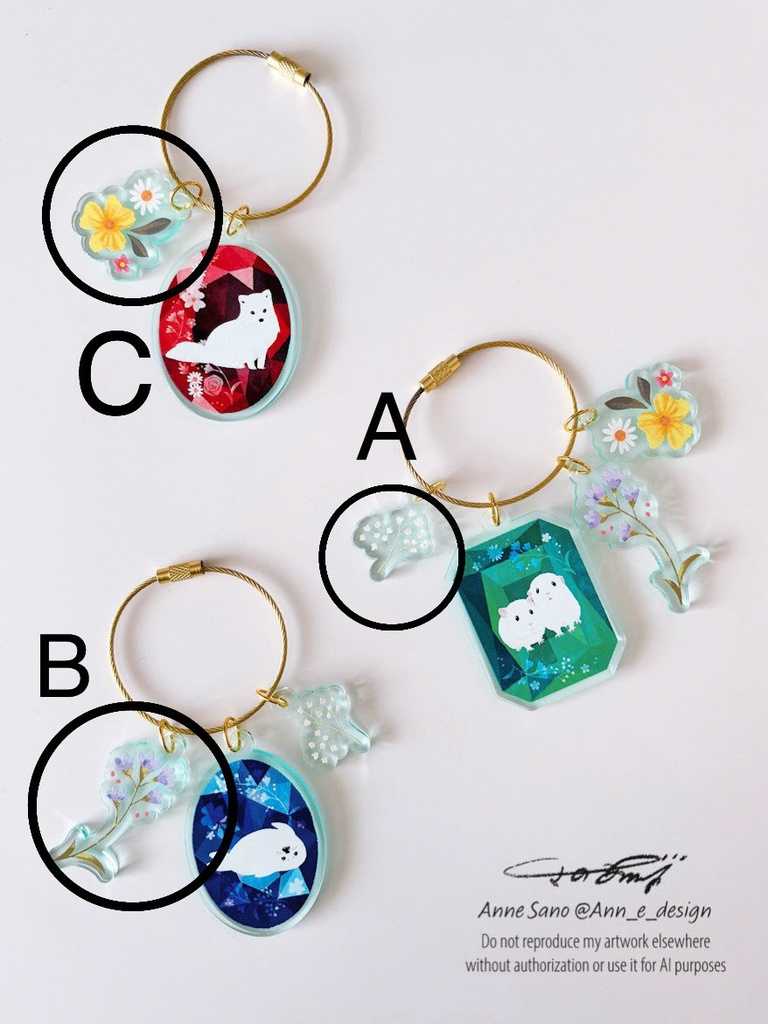 宝石と白い動物たちのアクリルキーホルダー