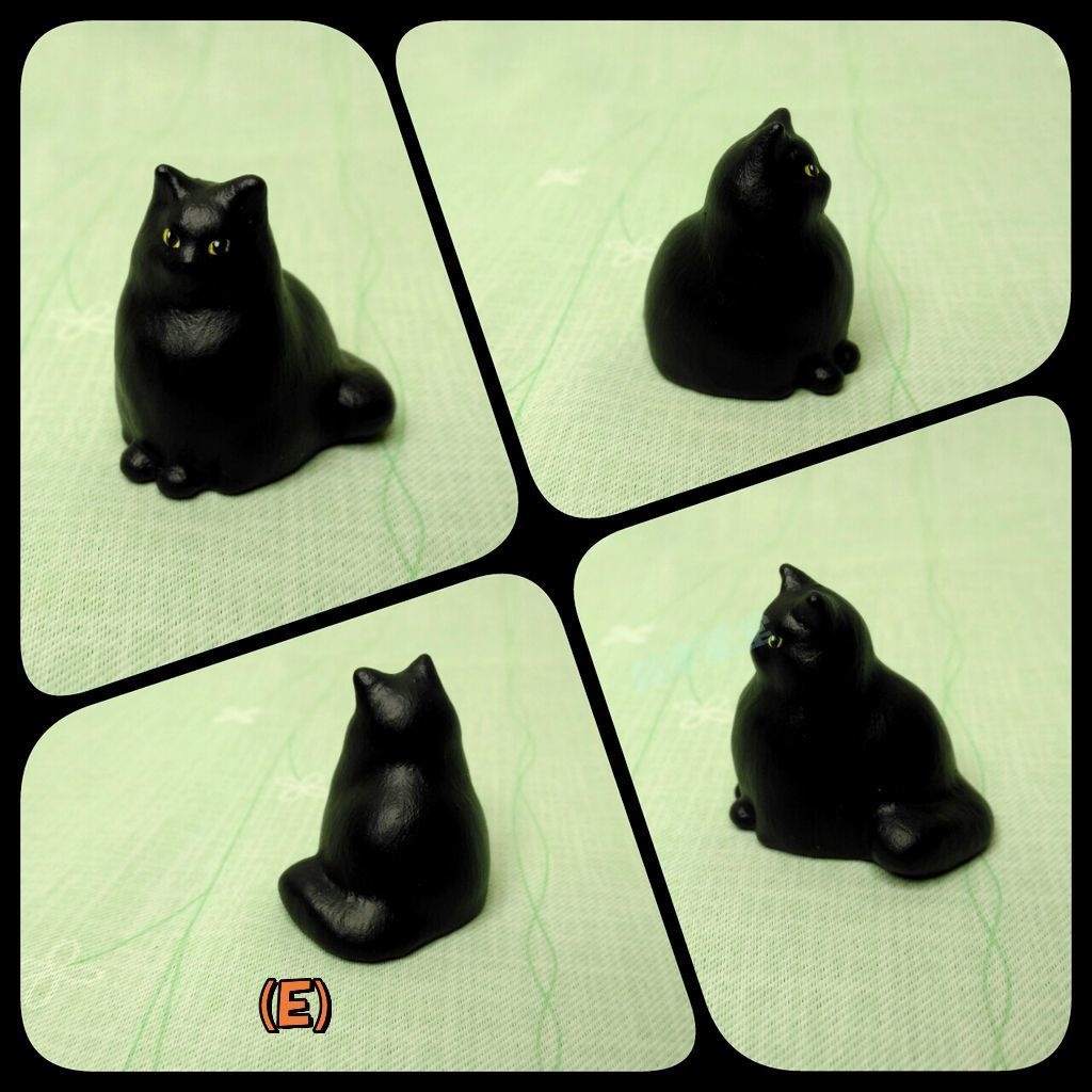 居る猫「おすまし」