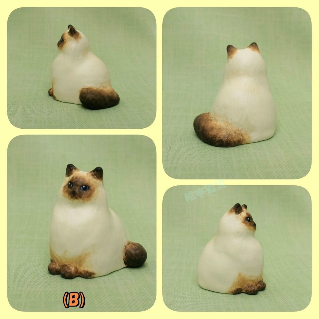 居る猫「おすまし」