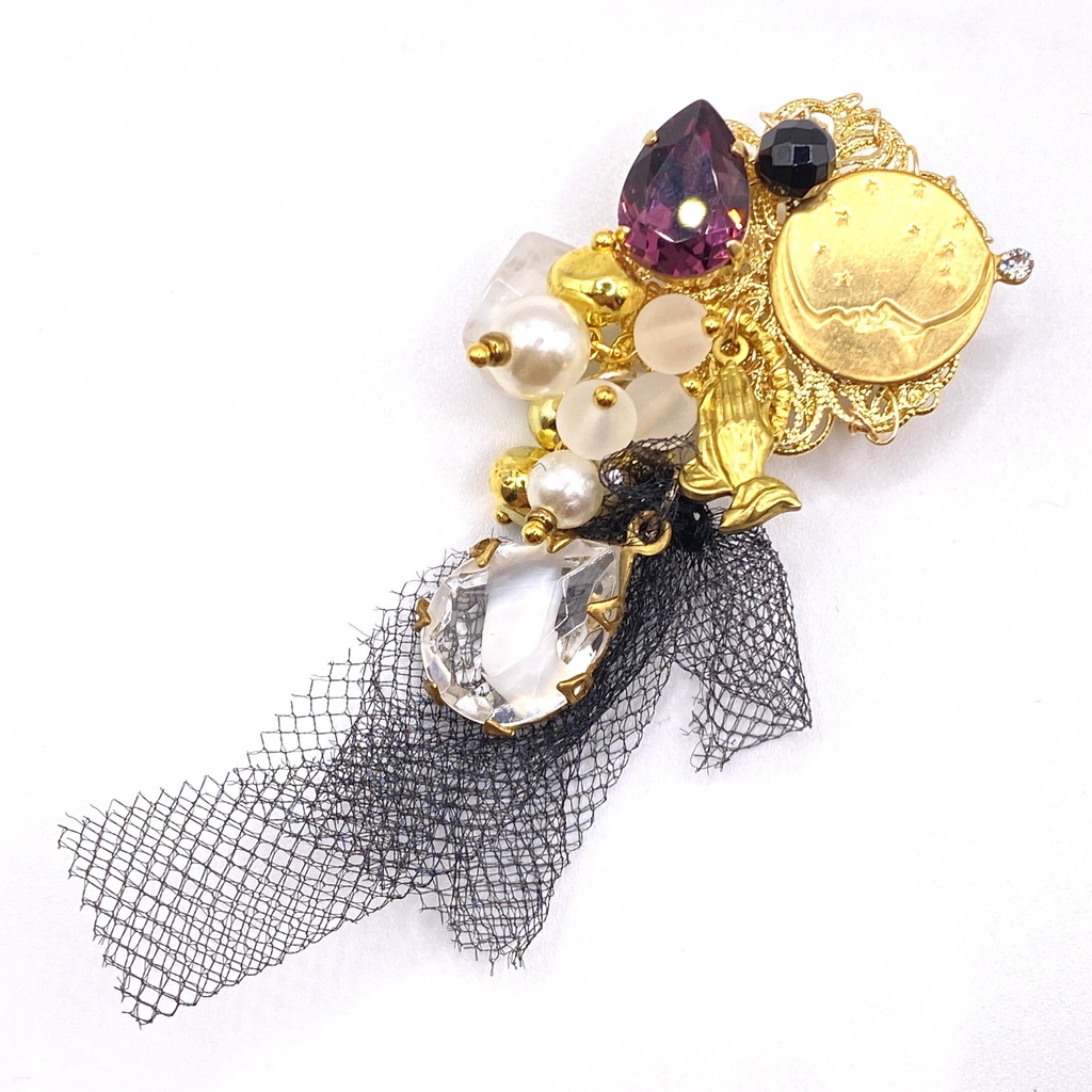 四十物十四イメージブローチ