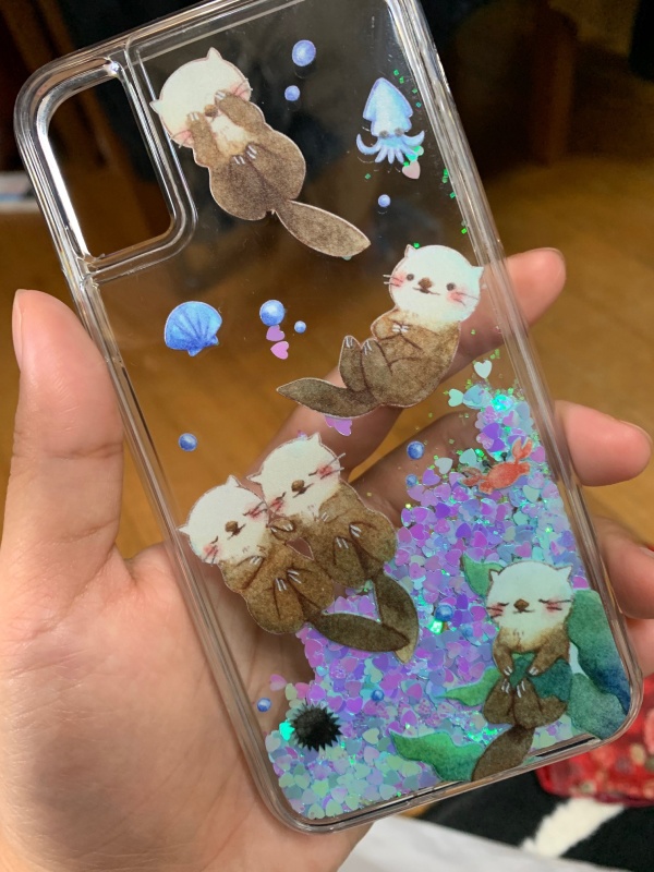 「ほんわかラッコくん」グリッタースマホケース