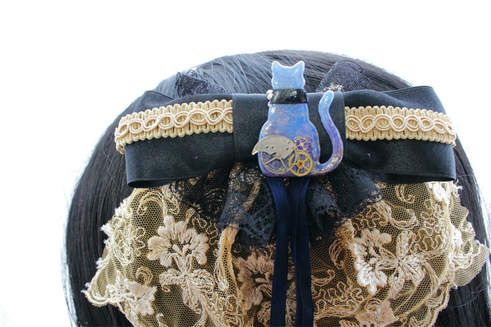 歯車猫の物憂いヘアクリップ