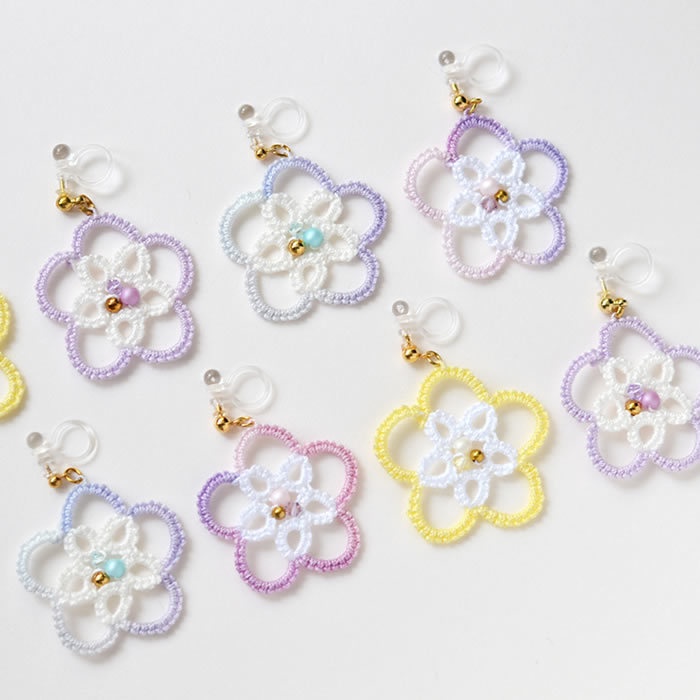 キラキラ輝く お花 樹脂イヤリング レース編み 大ぶり 花