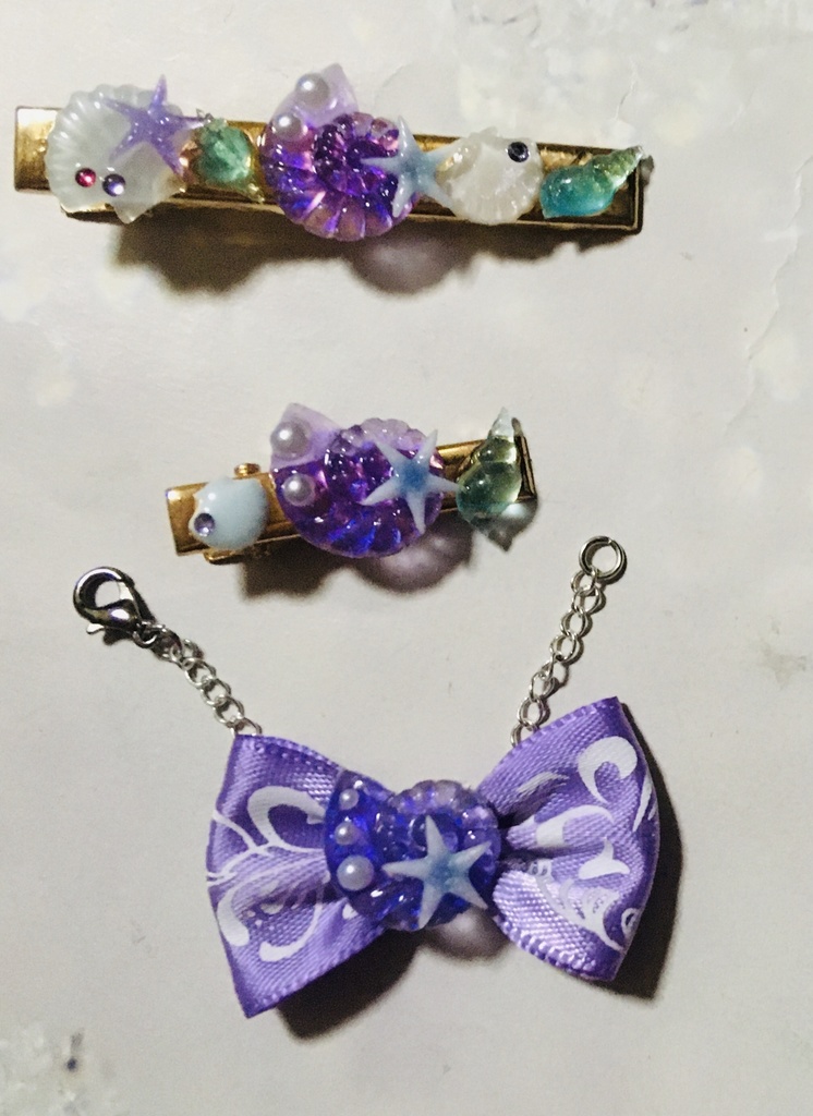 オクタイメージ ヘアクリップと蝶ネクタイ風ネックレス(レフト)