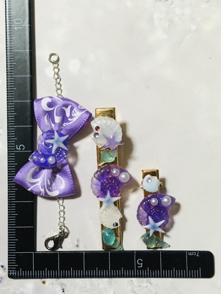 オクタイメージ ヘアクリップと蝶ネクタイ風ネックレス(レフト)