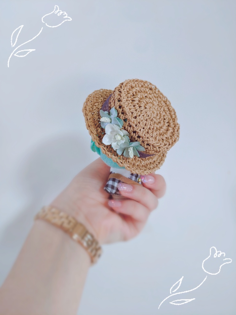 手編みのつば広カンカン帽