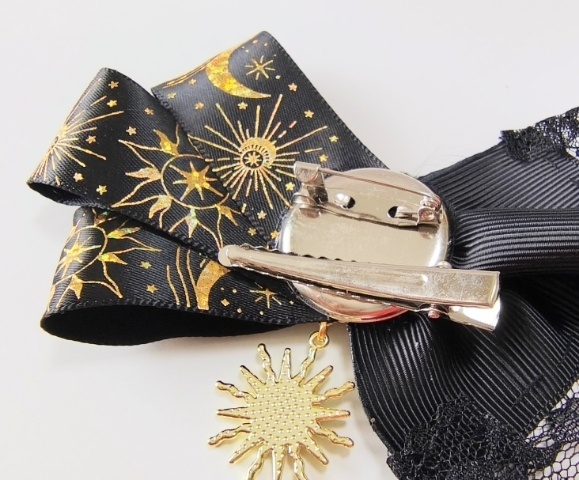 DARKNESS Sol Ribbonbroach