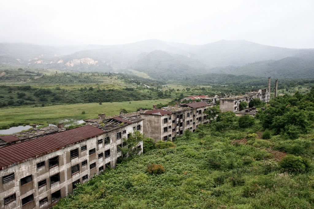 廃鉱山アパートのトイレの看板バッジ